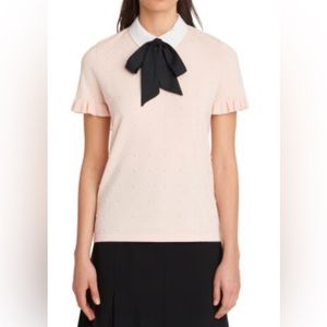 Karl Lagerfeld knit top, short sleeve, embellished with pearls and a black bow.